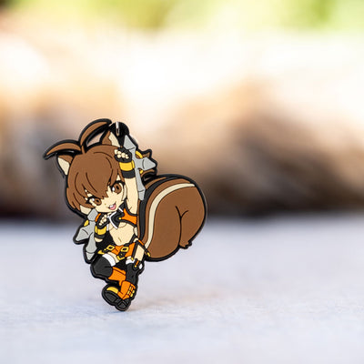 Image of the Makoto keychain, featuring a brighter backlight that adds contrast and a touch of radiance, with softly blurred fur elements in the background for aesthetic appeal.