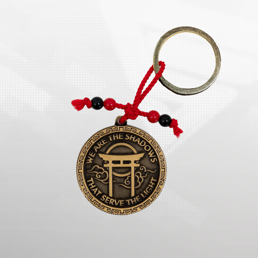 Official Assassin’s Creed Shadows keychain collectible, dual design