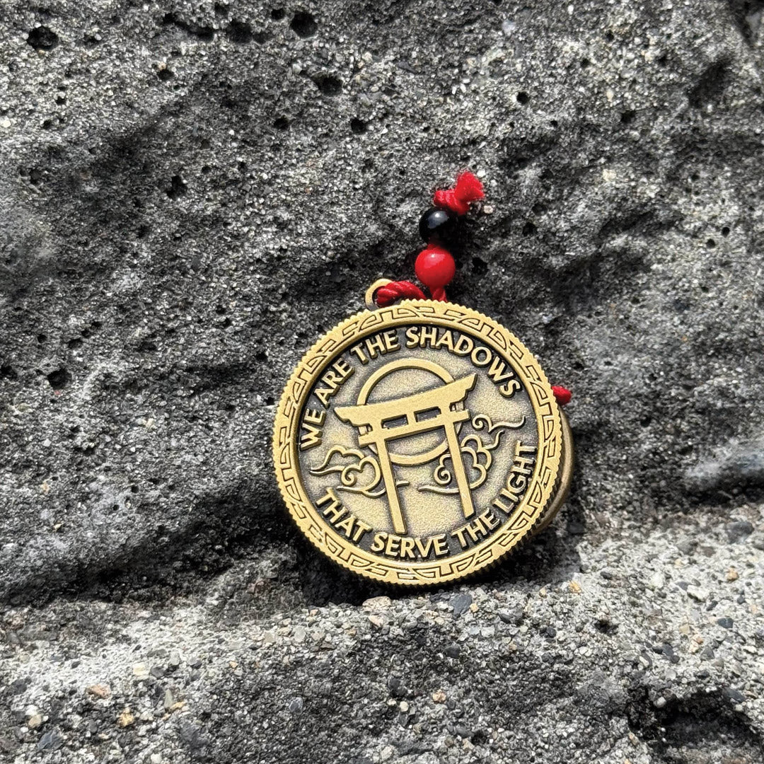 Official Assassin’s Creed Shadows keychain collectible, dual design