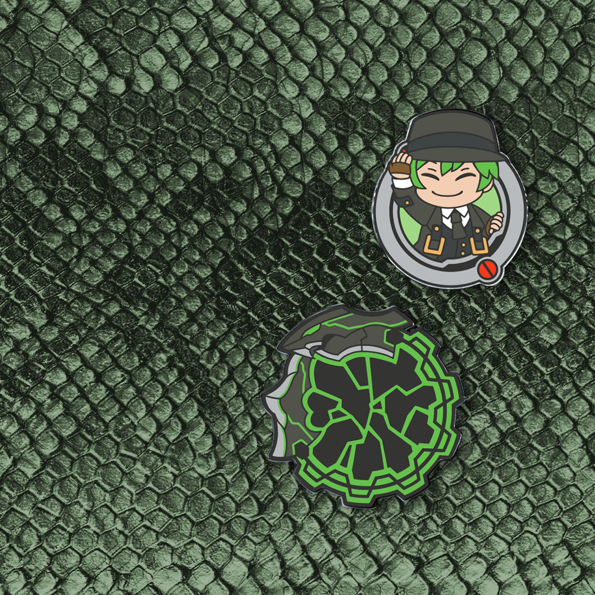 Closeup of the Blazblue Hazama Enamel Pin Set featuring the Hollow man and Ouroboros