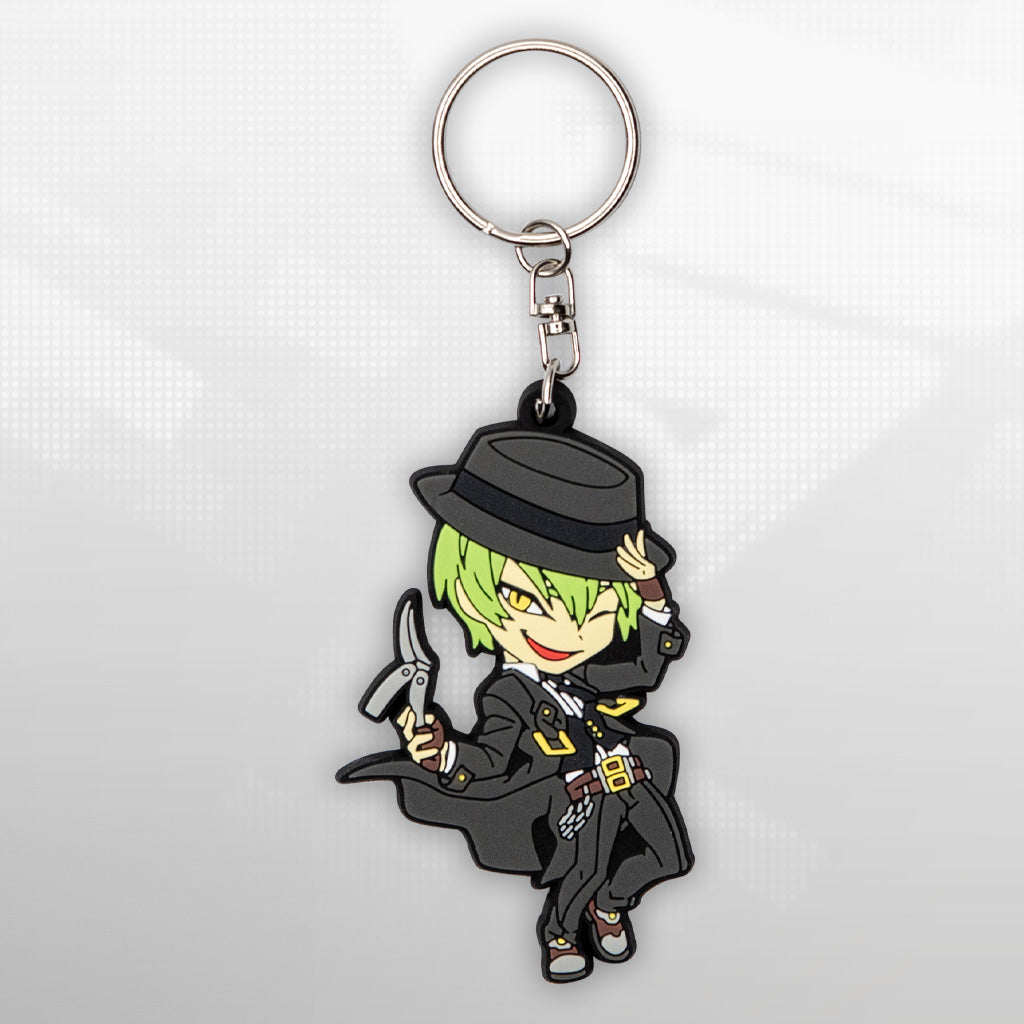 Blazblue Hazama keychain cutout on a pixelated background.