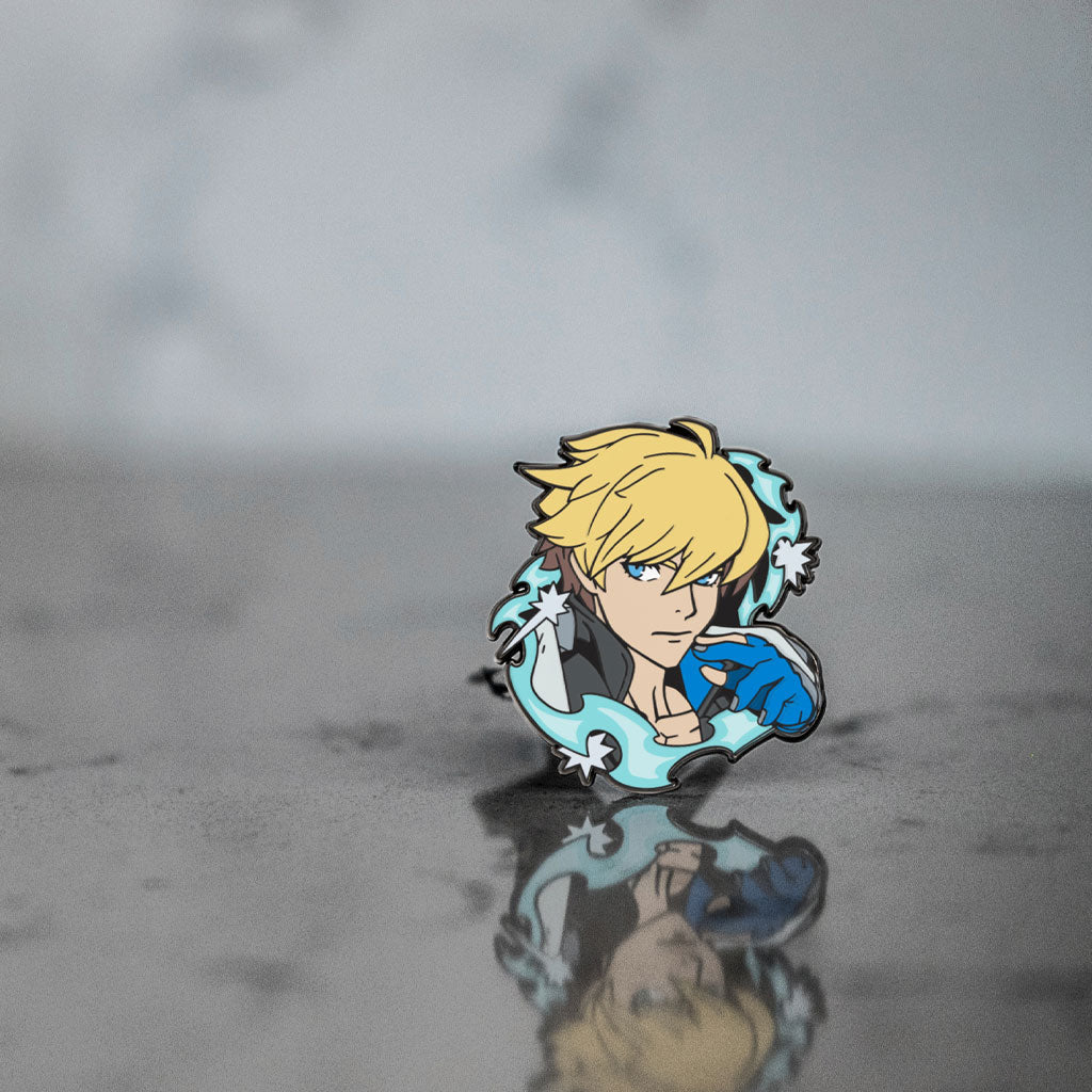 A photo of the Guilty Gear Ky Kiske Pin sitting on a pixellated background of grey and white.