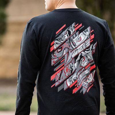 Photo of a man wearing the Persona 5 Rebellion long sleeve tee. He is facing away showing off the awesome design which is printed on the back of the shirt.