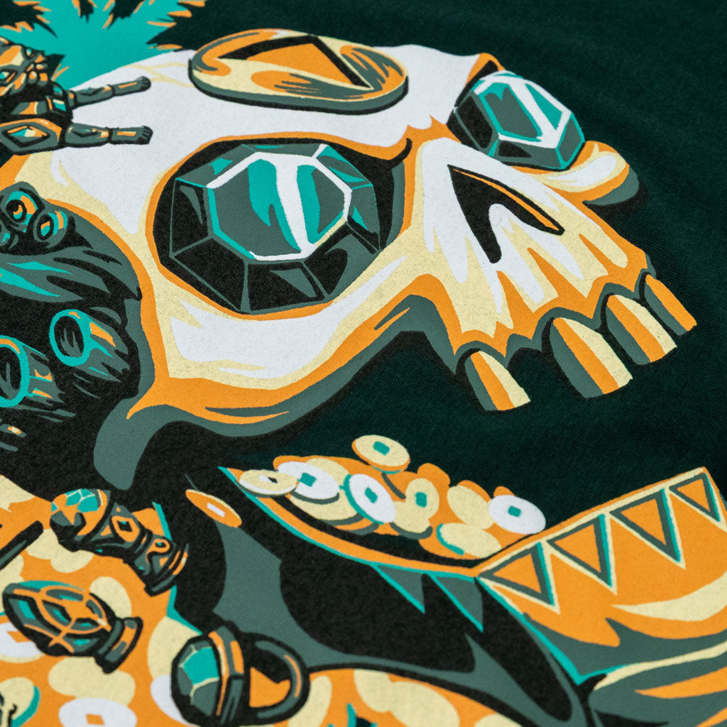 Close-up flatlay of the Sea of Thieves Gold Hoarder T-Shirt print showing detailed faction artwork