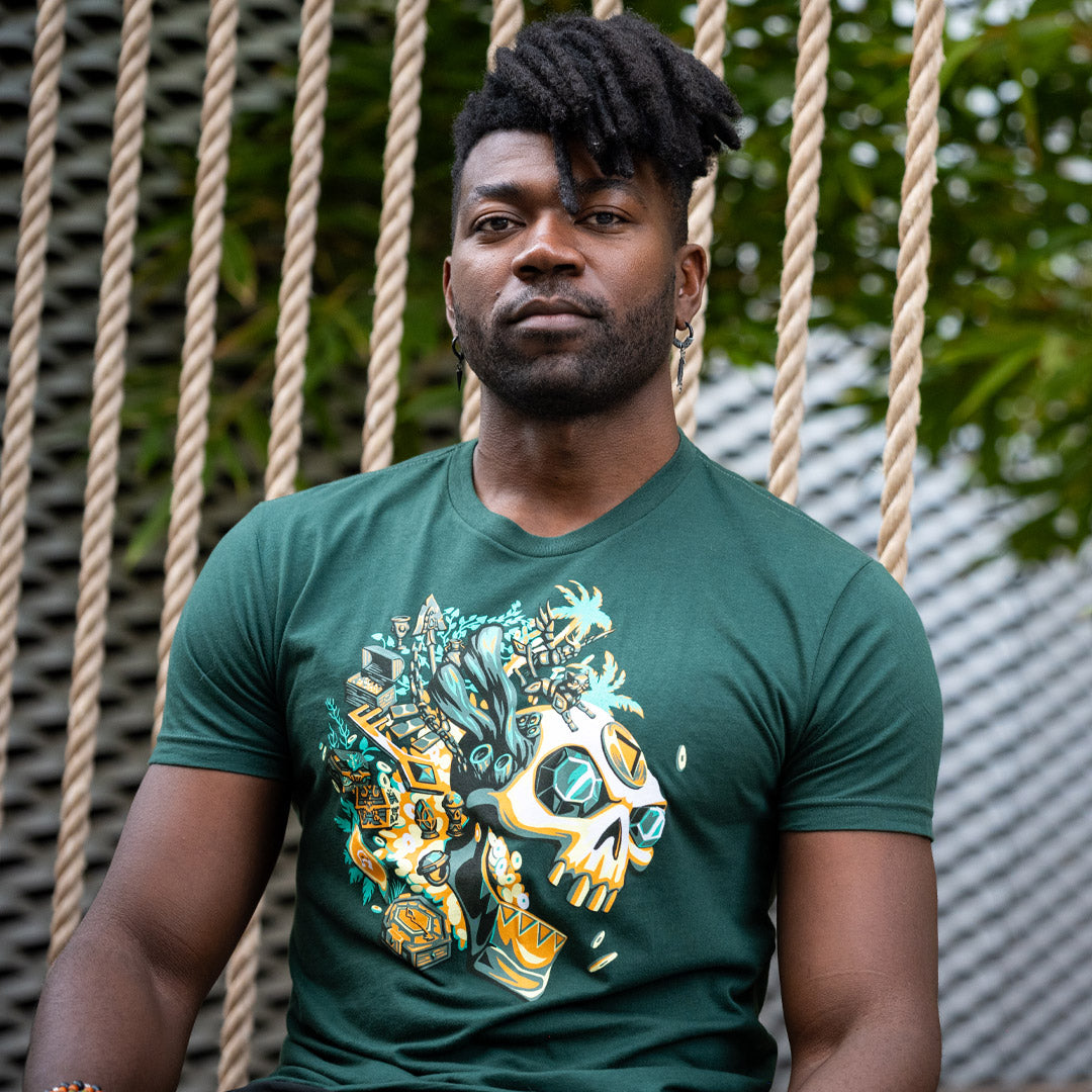 Model wearing the Sea of Thieves Gold Hoarder T-Shirt inspired by the treasure-hungry faction