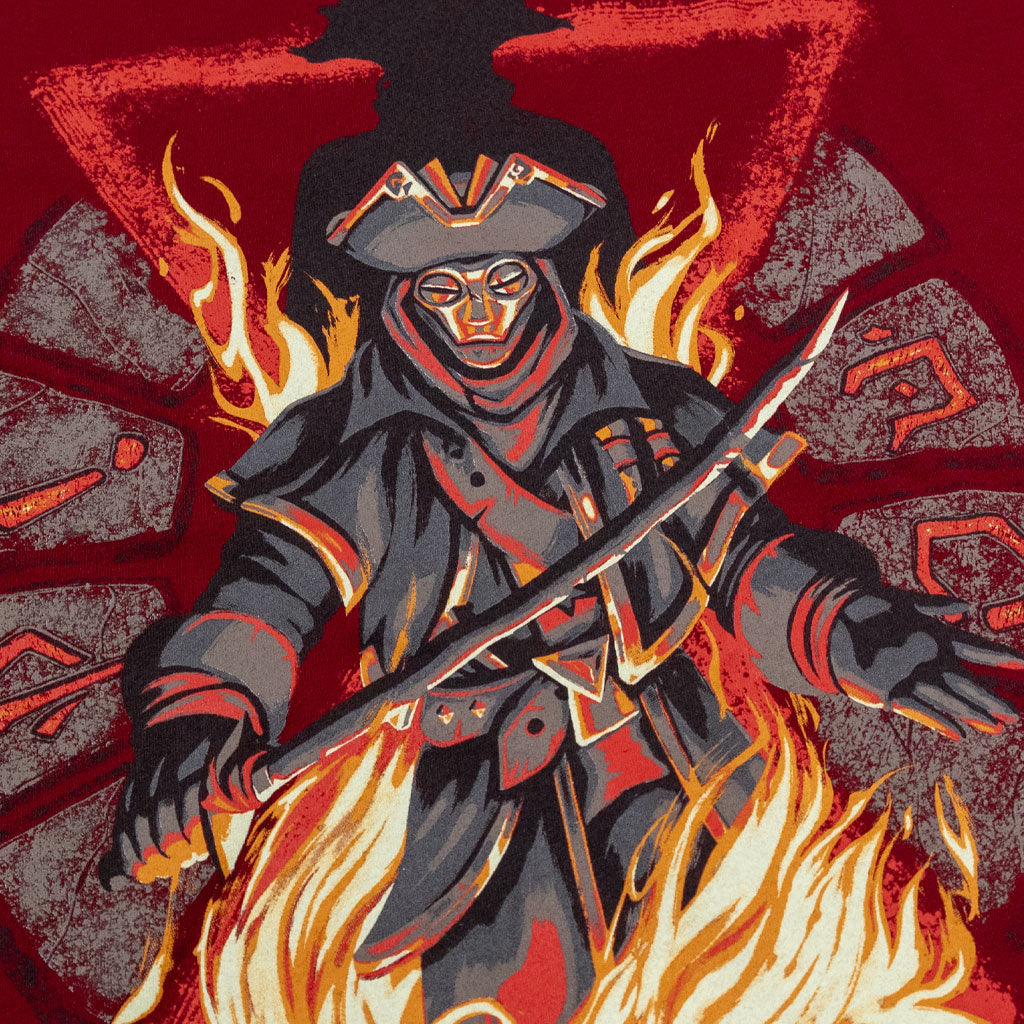 Closeup detail photo of the Sea of Thieves Reaper's Bones t-shirt depicting the Servant of the Flame