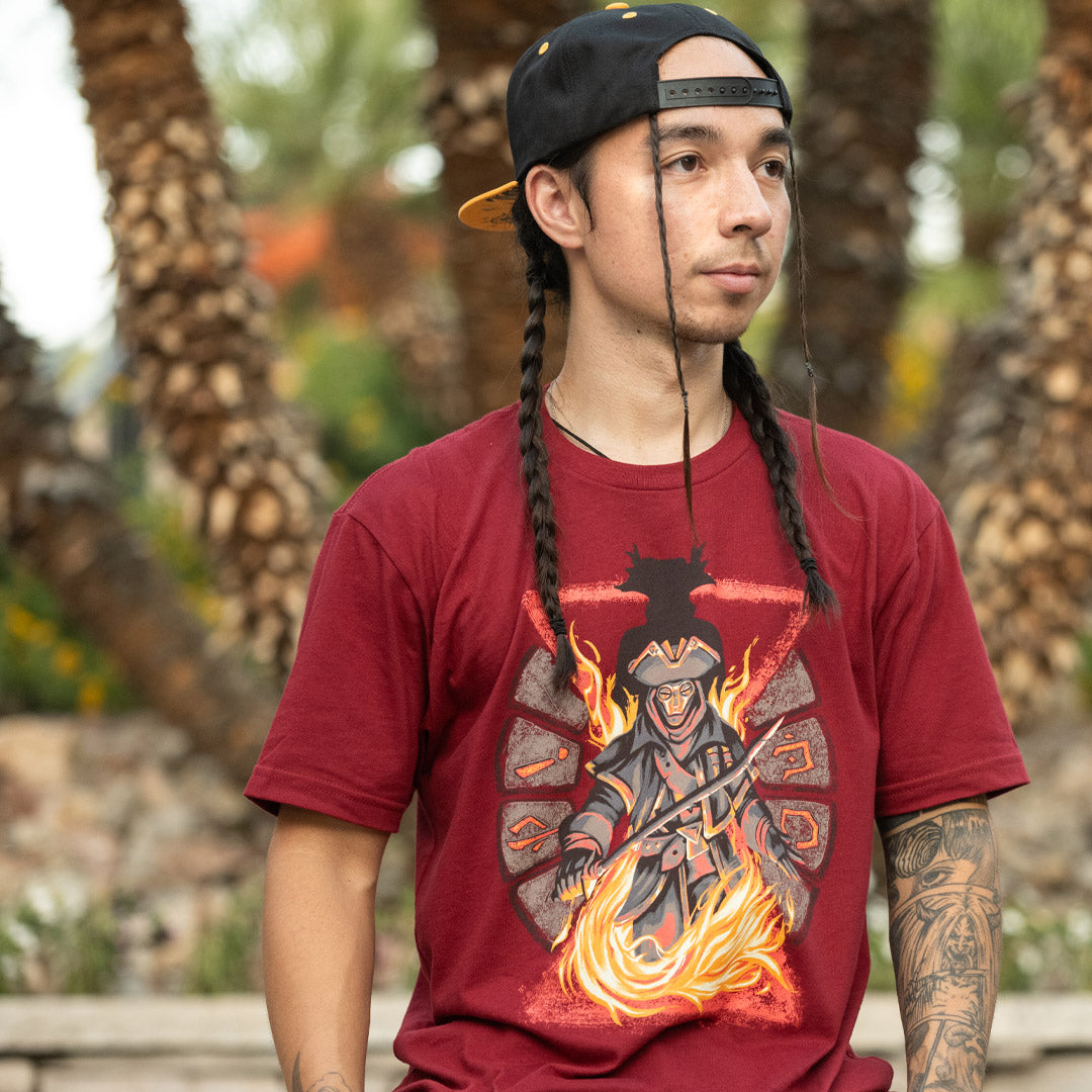Sea of Thieves Reaper’s Bones T-Shirt in maroon, worn by model showing bold pirate artwork