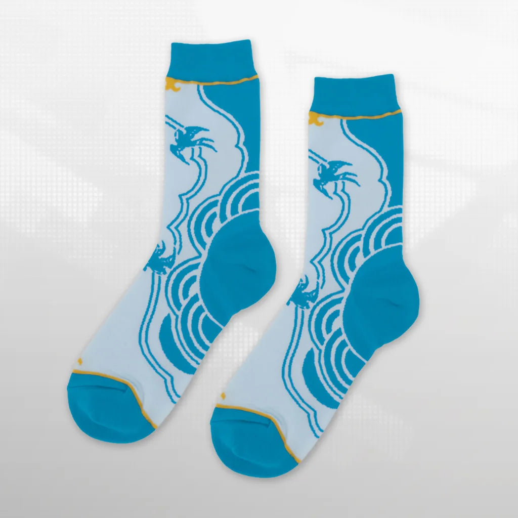Chun-Li Street Fighter 6 socks flat lay, blue cuff with white and blue pattern