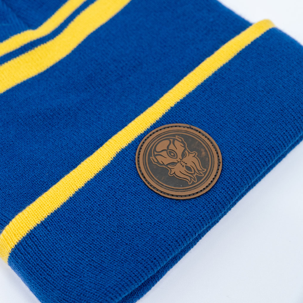 Closeup view of the Terraria Cultist beanie showcasing details of the Moon Lord woven patch.