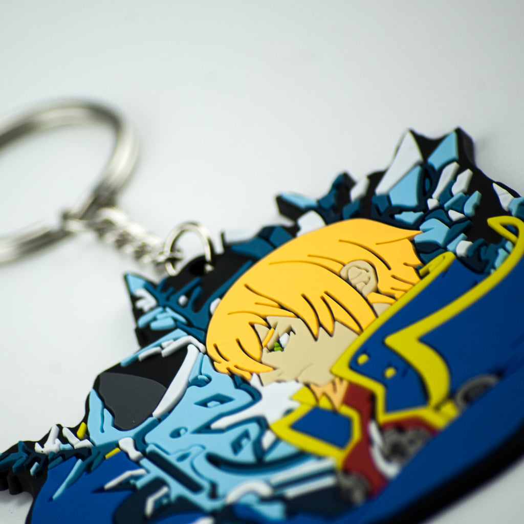 Blazblue Jin Portrait keychain by Eighty Sixed. Showing the keychain cutout on a pixelated background.