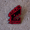 Image showcasing the 'Dead Spike' attack pin, inspired by Ragna, set against a textured stone background.