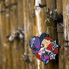 Persona 5 - Noir Keychain hanging on a fence
