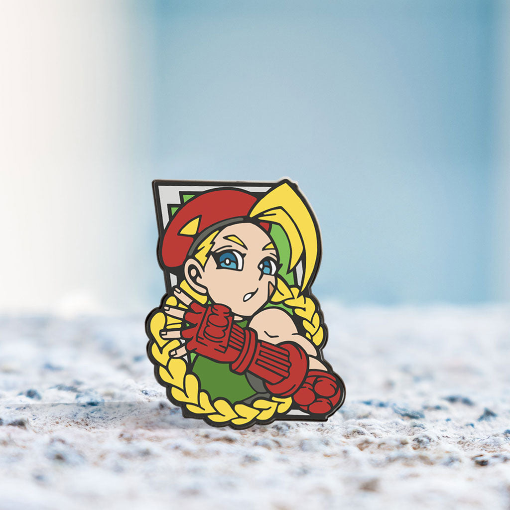 Limited Edition enamel pin of Cammy from Street Fighter in her iconic pose.